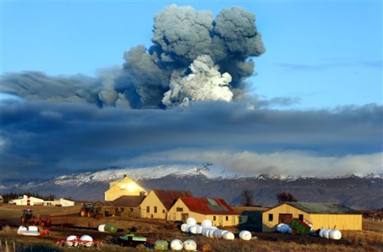 The volcano in southern Iceland's Eyjafjallajokull glacier sends ash into the air just prior to sunset, on April 16. The ash from the volcano paralyzed air traffic for days in Europe, disrupting travel for more than 7 million people. 